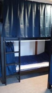 Μία ή περισσότερες κουκέτες σε δωμάτιο στο ゲストハウスたまねぎ +19 φωτογραφίες