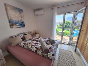 Postel nebo postele na pokoji v ubytování Casa Catalin + 8 fotografií