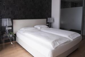 Postel nebo postele na pokoji v ubytování City-Hotel