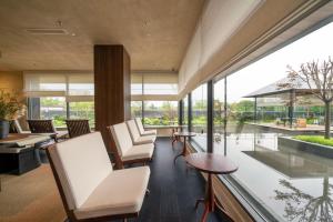 Et opholdsområde på Terra Art Hotel Chengdu--Featuring an exquisite rooftop garden--Offering Western breakfast and coffee&English speaking with tour services + 127 billeder