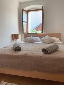 Postel nebo postele na pokoji v ubytování Apartment Estera