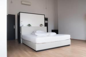 Postel nebo postele na pokoji v ubytování City-Hotel