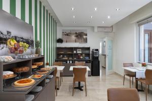a kitchen with a table with food on it at Il Torchio di Alchieri Moreno e C SAS in Pizzighettone