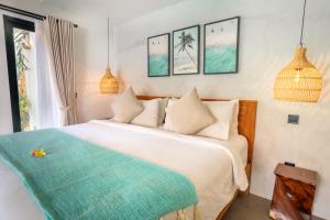 Villa Mint, 3Br Tropical Escape with Private pool and Lush Garden客房内的一张或多张床位