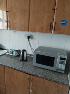 Η κουζίνα ή μικρή κουζίνα στο Major Apartment
