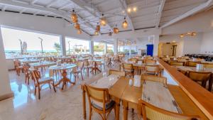 Ein Restaurant oder anderes Speiselokal in der Unterkunft Siu Collection - Ultra All Inclusive 