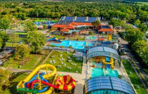 an aerial view of a water park with slides at Sunray Anker in Molenschot