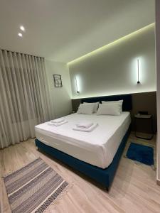 Krevet ili kreveti u jedinici u okviru objekta The cosy inn vlora +37 fotografija