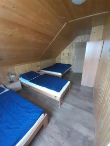 Postel nebo postele na pokoji v ubytování Domki DUET