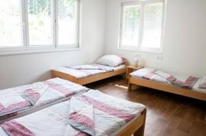 Voodi või voodid majutusasutuse Autocamp Slunce Žandov toas