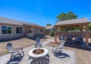a patio with chairs and a gazebo at Travelers Paradise, 3BR House Near Route 66 and Grand Canyon in Williams