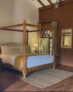 Postel nebo postele na pokoji v ubytování The Postcard Saligao + 101 fotografií