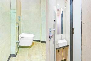 a bathroom with a toilet and a sink at Collection O Taragarh Fort in Ajmer