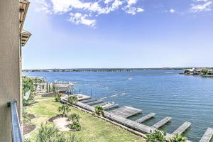a view of a body of water with a dock at Waterfront Condo on Lake LBJ with Pool & Views in Horseshoe Bay
