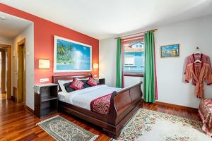 A bed or beds in a room at Hotel Kerala