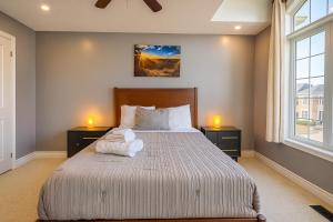 Ένα ή περισσότερα κρεβάτια σε δωμάτιο στο Large 5-Bedroom Gem - Stylish, Spacious, Well-Located +112 φωτογραφίες