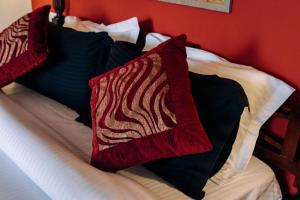 A bed or beds in a room at Hotel Kerala