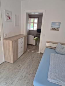 Postel nebo postele na pokoji v ubytování Haus am Wendsee
