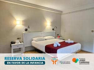 Voodi või voodid majutusasutuse Hotel Pere D'Urg 3000 toas
