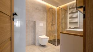 Łazienka w obiekcie Apartamenty Sun & Snow Ustroń Przy Rynku