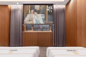 Giường trong phòng chung tại Xingshengjiu Courtyard Hotel Pingyao
