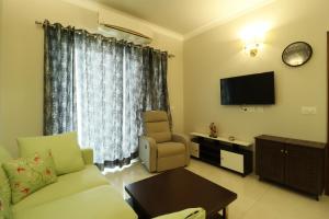 Billede fra billedgalleriet på Central Park 2BR Apt Near Gurugram Wid pool Access i Sohna