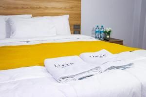 Postel nebo postele na pokoji v ubytování Hotel Litan Machu Picchu