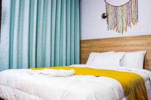 Postel nebo postele na pokoji v ubytování Hotel Litan Machu Picchu