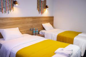 Postel nebo postele na pokoji v ubytování Hotel Litan Machu Picchu