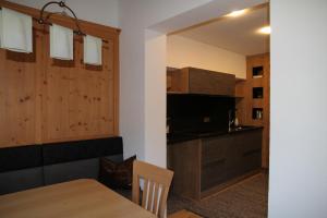 Kuchyň nebo kuchyňský kout v ubytování Appartements Familie Eberharter