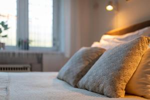 Posteľ alebo postele v izbe v ubytovaní Sunbird Apartman Budapest