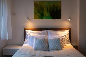 Posteľ alebo postele v izbe v ubytovaní Sunbird Apartman Budapest