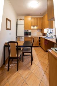 Kuchyňa alebo kuchynka v ubytovaní Sunbird Apartman Budapest