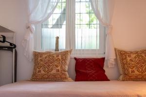 Posteľ alebo postele v izbe v ubytovaní Sunbird Apartman Budapest