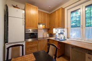 Kuchyňa alebo kuchynka v ubytovaní Sunbird Apartman Budapest