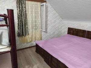 Postel nebo postele na pokoji v ubytování Guest house Family