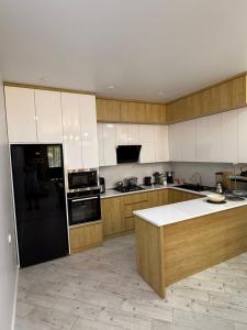 Kuchyň nebo kuchyňský kout v ubytování Guesthouse Mtsvane Koncxi 22