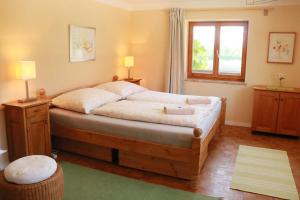 Łóżko lub łóżka w pokoju w obiekcie Bio Archehof Zachhiesen - stay & relax