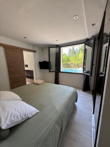 Llit o llits en una habitació de La maison vauclusienne 26 fotos més