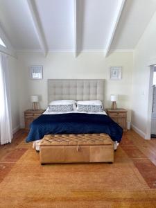 Postel nebo postele na pokoji v ubytování #uitdiebloute