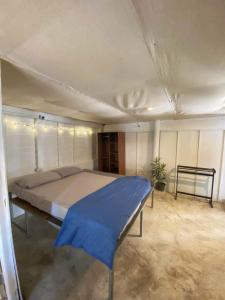 Postel nebo postele na pokoji v ubytování MoovInn Garden Guesthouse