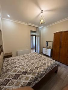 Postel nebo postele na pokoji v ubytování Guesthouse Mtsvane Koncxi 22
