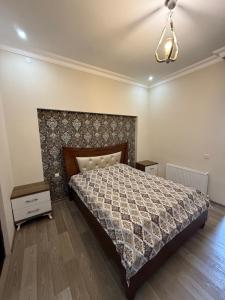 Postel nebo postele na pokoji v ubytování Guesthouse Mtsvane Koncxi 22