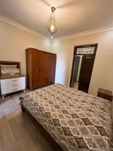 Postel nebo postele na pokoji v ubytování Guesthouse Mtsvane Koncxi 22