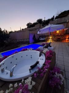 Bazén v ubytování Kabak Freedom Deluxe Hotel nebo v jeho okolí