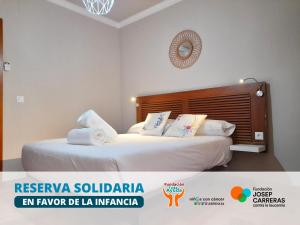 Posteľ alebo postele v izbe v ubytovaní Apartamentos Alhambra Granada 3000