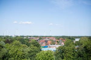 a view of a town with houses and trees at Wohnung Smart-TV, Küche, Balkon in Emden