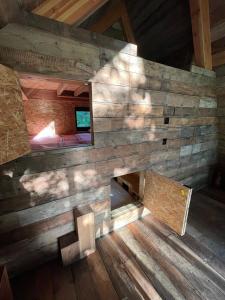 an overhead view of a wooden wall in a room at Island A-Frame in Winchester