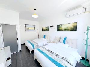 Krevet ili kreveti u jedinici u okviru objekta Beijing Great Wall Shiguang Homestay