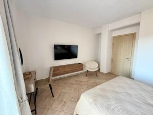 TV a/nebo společenská místnost v ubytování Seaview Methoni